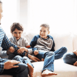 Happy Family Talking On Couch During Holidays 1024x469